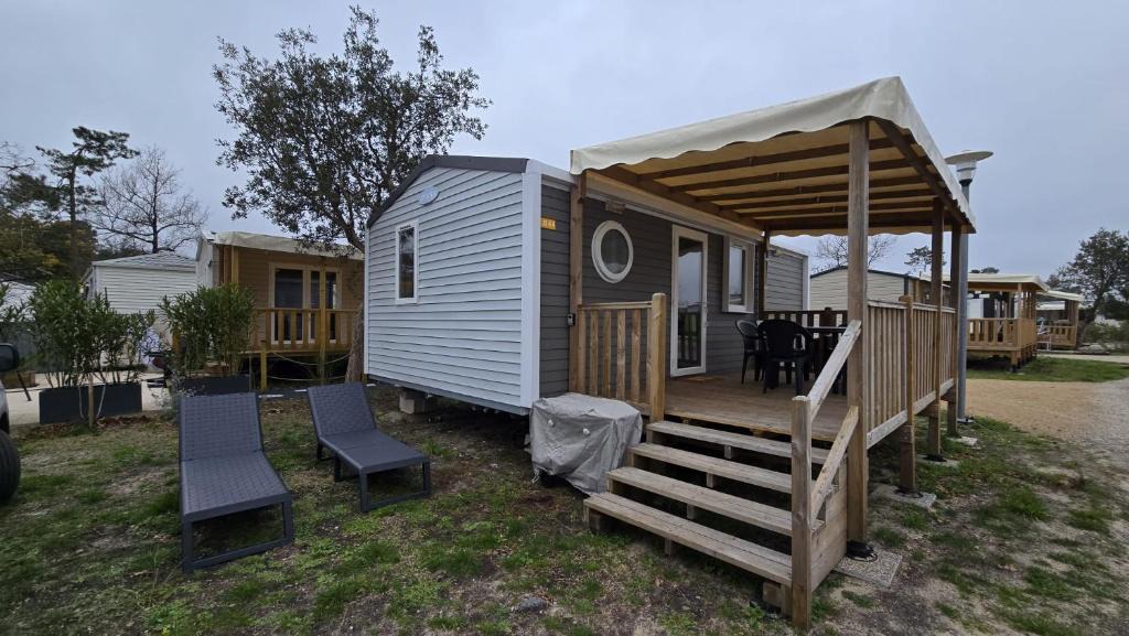 Lege-Cap-Ferret House | Mobilhome 6 pers-vue bassin-plage-clim