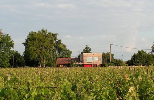 Pessac Villa | Design villa in the vineyards of Chateau Pape Clement with pool and spa