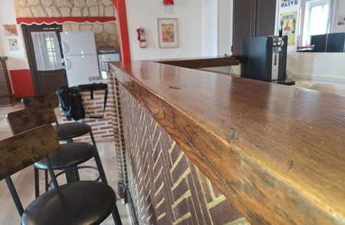 Saint-Brisson-sur-Loire Condo | Gîte de l'Olivier, furnished rooms, large living area and bar.