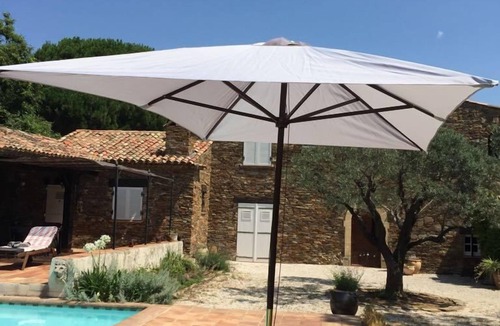 La Garde-Freinet Apartment | Pretty apartment with pool in stunning stone house in large quiet garden