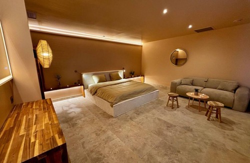 Poitiers Apartment | Private spa suite with Jacuzzi, sauna, sensory shower, Japanese massage chair