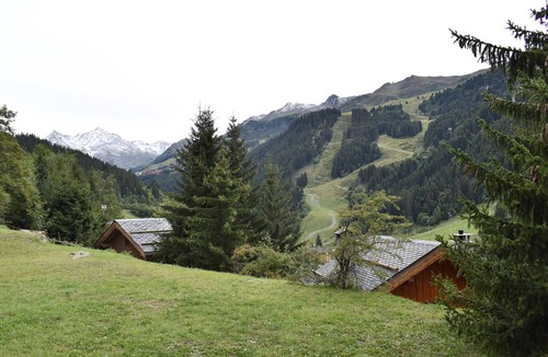 Meribel Centre Apartment | Ski-In/Ski-Out Apartment with Fireplace and Balcony in Méribel