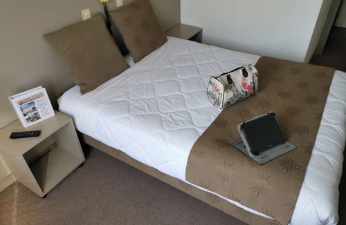 Lourdes Hotel | Spacious Unit Stay, Secure Parking, Scenic Views!