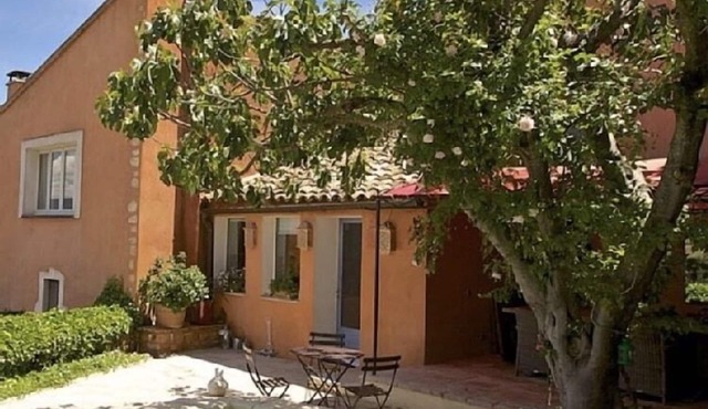 A vast village villa with stunning views, an outdoor garden, a pool, and AC.