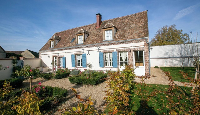 Charming renovated apartment in old house with garden