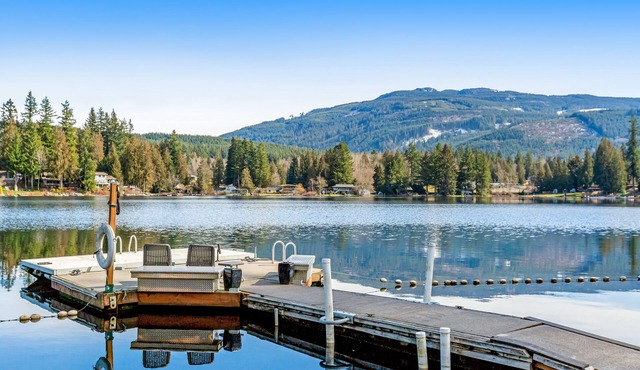 Custom lakefront gem with private dock, hot tub, firepit, & chef's kitchen in Sedro-Woolley
