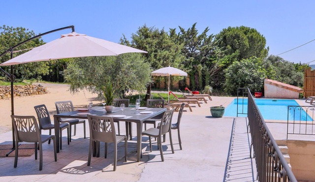 Enjoy a wonderful view of the countryside in this comfortable vacation home with pool!