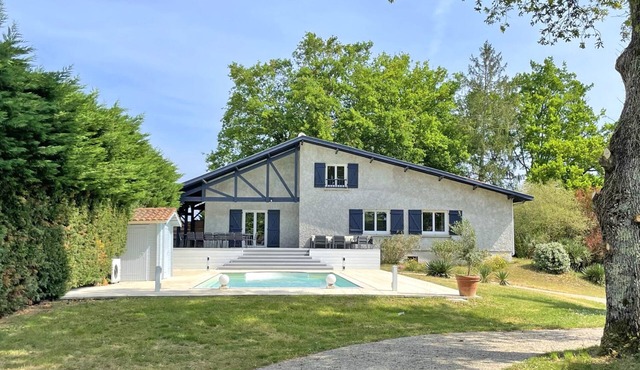 Large family villa with swimming pool and wooded grounds