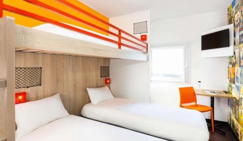 Break Room with Three Single Bunk Beds and Shared Bathroom